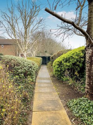 PATH TO COVERED PERGOLA SEATING AREA- click for photo gallery